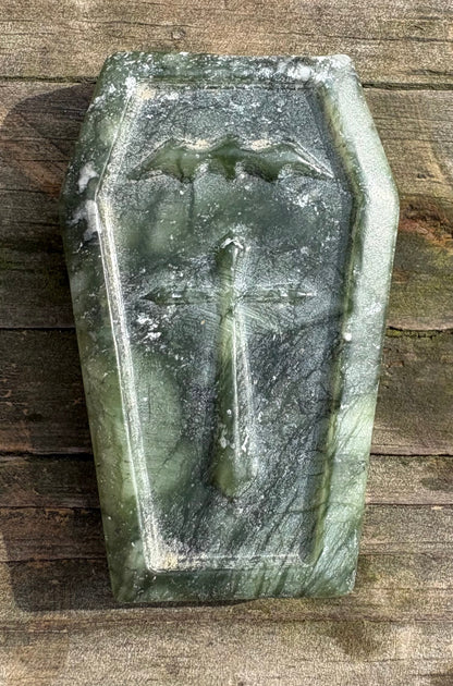 Serpentine Coffin Carving