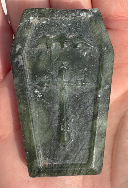 Serpentine Coffin Carving